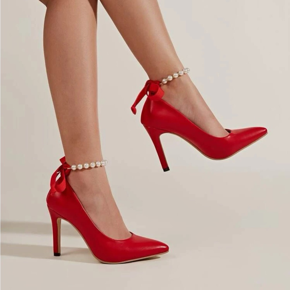 NEVER WORN red heels with Pearl strap